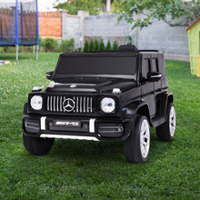 Licensed Mercedes Benz AMG G63 toy car with Remote Control - Kids Ride On Electric Car from kidscarz.com.au, we sell affordable ride on toys, free shipping Australia wide, Load image into Gallery viewer, Outdoors Side view of a black Licensed Mercedes Benz AMG G63 toy car with Remote Control - Affordable Kids Ride On Electric Car for Australian children
